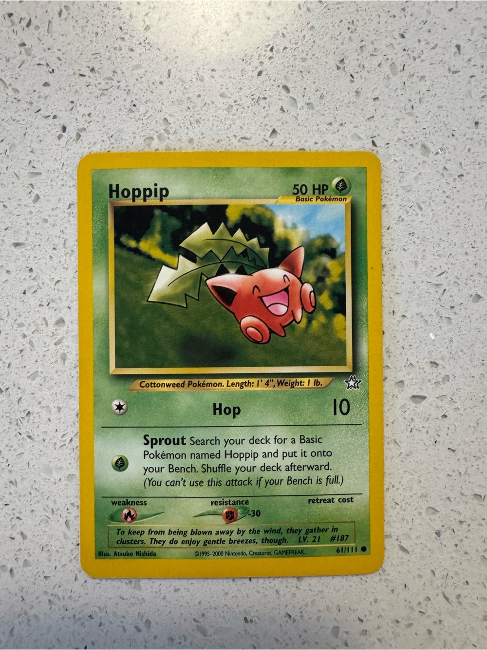 3/$10 A 2000 Neo Genesis Hoppip Pokémon TCG card.